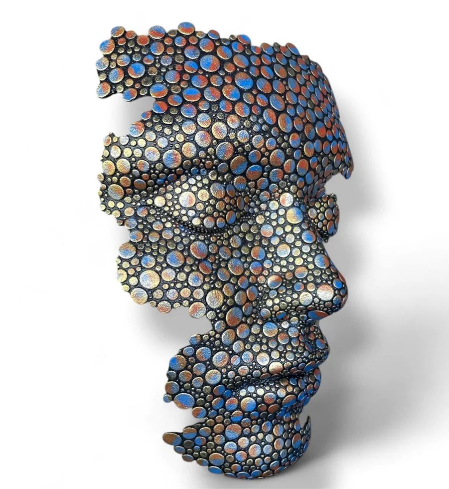 Galaxy face sculpture by Marco Olivier